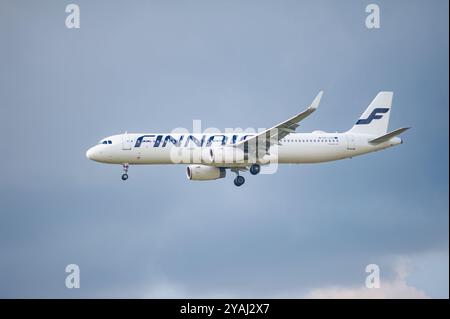 02.06.2024, Germany, , Berlin - Europe - A Finnair Airbus A321-231 passenger aircraft with the registration OH-LZU on approach to Berlin Brandenburg A Stock Photo