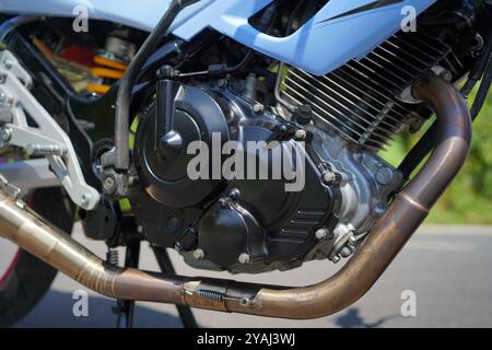 close up of a 4-Stroke underbone category motorbike engine Stock Photo