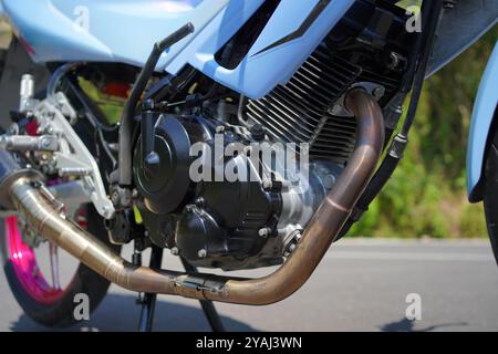 close up of a 4-Stroke underbone category motorbike engine Stock Photo