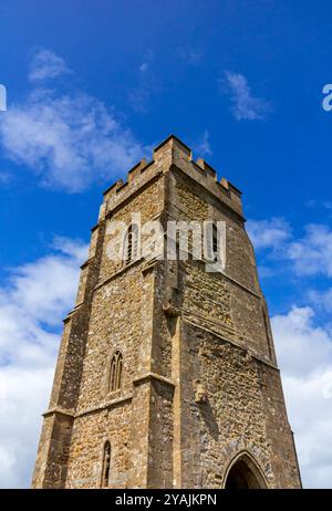 View looking up at the tower of St Michael's Church on Glastonbury Tor in summer Somerset England UK Stock Photo