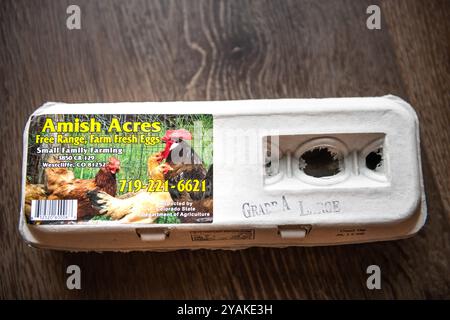 Avon, USA - June 26, 2022: Eggs dozen in carton from Amish acres small family farming farm from Westcliffe Colorado grade A large food Stock Photo