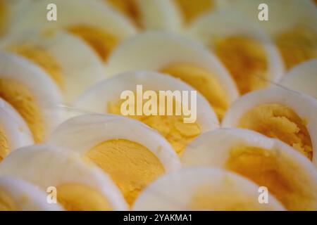 Sliced Eggs as a condiment under plastic wrap Stock Photo