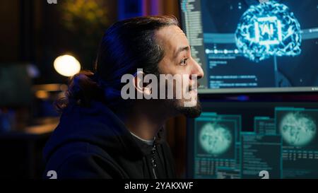 Hacker using AI machine learning on computer to produce malware corrupting data. Scammer working on PC using artificial intelligence tech, infecting systems, close up shot, camera A Stock Photo