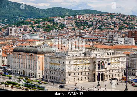 Trieste Italy,Riva Tre Novembre promenade street,waterfront buildings,Teatro Lirico Giuseppe Verdi opera house,Piazza Giuseppe Verdi,Prefettura di Tri Stock Photo