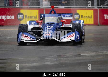 INDYCAR Series driver, ALEX PALOU (10) of Barcelona, Spain, travels through the turns during a wet and dangerous practice session for the Big Machine Stock Photo