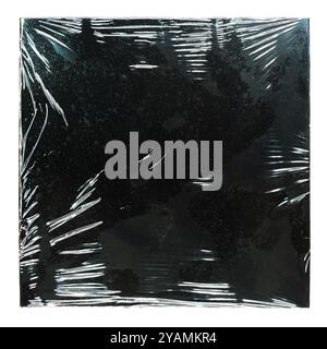 Black album cover with plastic wrap film texture on white background with clipping path Stock Photo