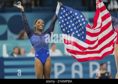 Simone Biles (USA) of the United States celebrates with the fans after winning the Artistic Gymnastics Women's All-Around Final at the Bercy Arena dur Stock Photo