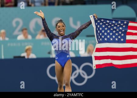 Simone Biles (USA) of the United States celebrates with the fans after winning the Artistic Gymnastics Women's All-Around Final at the Bercy Arena dur Stock Photo