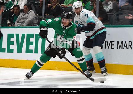 Dallas, United States. 13th Oct, 2024. Sam Steel #18 of Dallas Stars skating on the ice whit the puck during the NHL match between Dallas Stars and the Seattle Kraken at American Airlines Center. Final score Dallas Stars 2-0 Seattle Kraken. on October 13, 2024 in Dallas, Texas. (Photo by Javier Vicencio/Eyepix Group) Credit: Eyepix Group/Alamy Live News Stock Photo