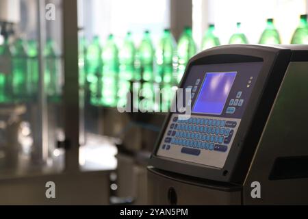 Automatic conveyor line for bottling mineral water in plastic bottles Stock Photo