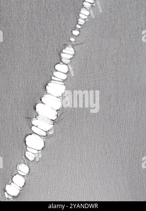 Black laddered nylon elasticated micro mesh fabric texture background Stock Photo