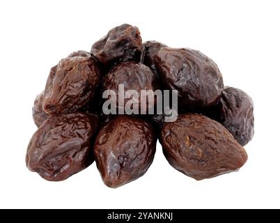 Group of prunes made from dried plumb fruits high fibre healthy food ingredient isolated on a white background Stock Photo