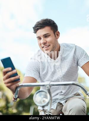 Travel, phone and man with bicycle in city for morning commute, adventure and journey. Transport, cycling and person with bike on smartphone for Stock Photo