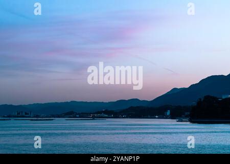 Beautiful sky view in Hiroshima Bay, on a boat to Mijayima island. Stock Photo