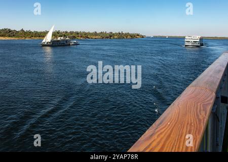 Aswan, Egypt; January 17, 2024: Be amazed by the sight of a thousand ships gracefully sailing down the Nile River. Experience the grandeur. Stock Photo