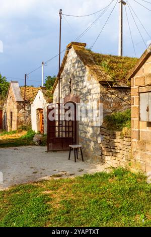Small, traditional wine cellars at the hill on the outskirts of the village. Bogacs, Hungary Stock Photo