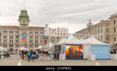 Trieste, Italy - October 08, 2024: Public University of Trieste Tent at Main Square in Front of Town Hall During Barcolana Yacht Race. Stock Photo