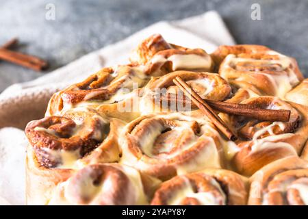 Traditional swedish cinnamon rolls on gray background, close-up Stock Photo