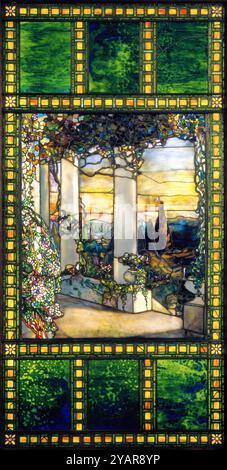 Hinds House Window c. 1900 maker Tiffany Glass & Decorating Company (America, New York, 1892–1902) Leaded glass . In this window commissioned for the Howell Hinds house around 1900, thousands of richly colored glass pieces have been arranged and layered to paint an idyllic three-dimensional scene that would have warmly glowed in the afternoon sunlight. Located at 2200 Overlook Road in Cleveland, Ohio, the house was demolished in 1930 in a similar fate as other nearby estates. Photographs show the placement of the window in the drawing room next to the fireplace as well as the opulent interiors Stock Photo