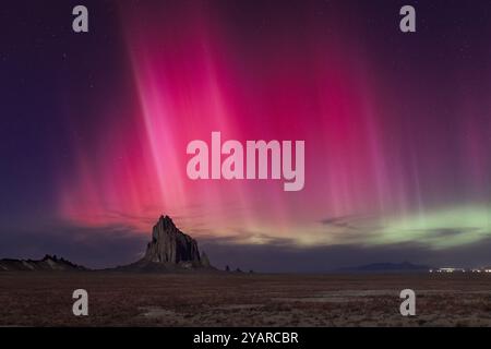 The aurora borealis or northern lights over Shiprock, New Mexico Stock Photo