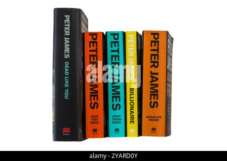 Selection of Peter James books with Billionaire book on top isolated on ...