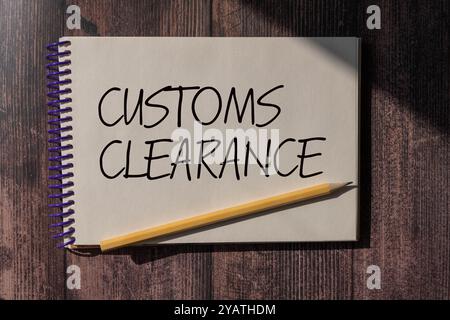 CUSTOMS CLEARANCE text on a sticky on chart with pencil Stock Photo