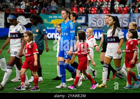 Vancouver, Canada. 15th Oct, 2024. Vancouver, British Columbia, Canada, October 15th 2024: Vancouver Whitecaps FC Girls walk onto the pitch before the Concacaf W Champions Cup group stage match between Vancouver Whitecaps FC Girls Elite and Portland Thorns FC at BC Place Stadium in Vancouver, British Columbia, Canada (EDITORIAL USAGE ONLY). (Amy Elle/SPP) Credit: SPP Sport Press Photo. /Alamy Live News Stock Photo