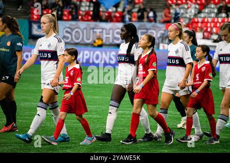 Vancouver, Canada. 15th Oct, 2024. Vancouver, British Columbia, Canada, October 15th 2024: Vancouver Whitecaps FC Girls walk onto the pitch before the Concacaf W Champions Cup group stage match between Vancouver Whitecaps FC Girls Elite and Portland Thorns FC at BC Place Stadium in Vancouver, British Columbia, Canada (EDITORIAL USAGE ONLY). (Amy Elle/SPP) Credit: SPP Sport Press Photo. /Alamy Live News Stock Photo