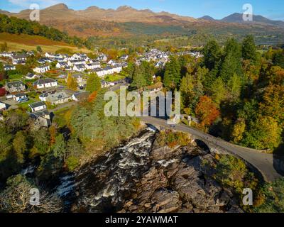 Aerial view from drone of River Dochart at Falls of Dochart in Killin village, Perthshire,  in Scottish Highlands, Scotland UK Stock Photo