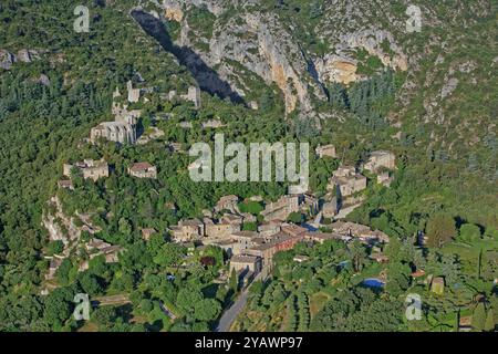 France, Vaucluse department, Oppède-le-Vieux, tourist village backed the Luberon, aerial view Stock Photo