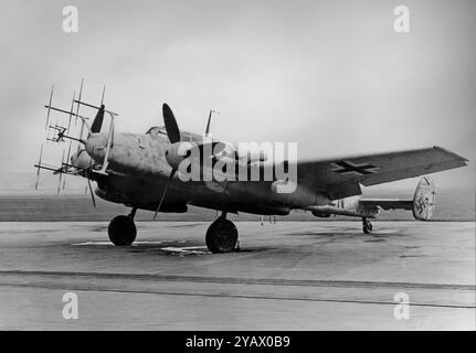 A Messerschmitt Bf 110, aka Me 110, was a twin-engined fighter-bomber and night fighter developed in  Germany in the 1930s and used by the Luftwaffe during World War II. Hermann Göring was a proponent of the Bf 110, believing its heavy armament, speed, and range would make the Bf 110 the Luftwaffe’s premier offensive fighter. Stock Photo