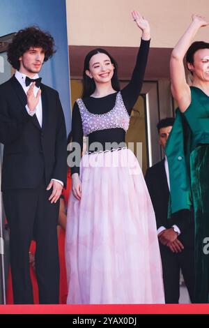 Mikey Madison, front and Mark Eydelshteyn onstage during the Oscars on