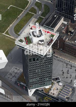 On the roof of ADAM Tower Europe's tallest swing. On the Lookout tower in Amsterdam, the logo Hello, I'm A'dam is written in large letters. netherlands out - belgium out Stock Photo