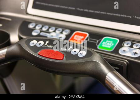 treadmill at the gym close up on the handles and control panel Stock Photo