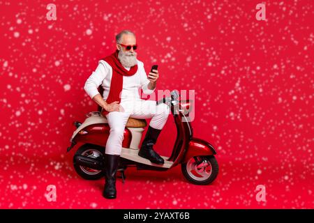 Full length body size view of his he nice attractive well-groomed stylish confident content focused gray-haired man using internet online browsing 5g Stock Photo