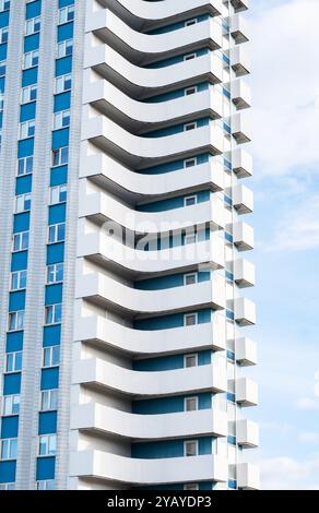 Visual Reference: Modern Apartment Building Featuring Unique Balconies Stock Photo