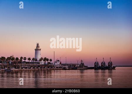 Sunset over Malaga harbor, Spain Stock Photo