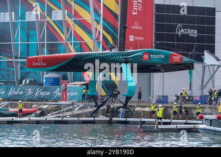 PPL PHOTO AGENCY - COPYRIGHT RESERVED 2024 America's Cup - Barcelona, Spain Emirates Team New Zealand AC75 foiling yacht TAIHORO is being put down to water by crane for day 4 race 5 & 6 in Barcelona for  preparing to defend the 2024 America's Cup PHOTO CREDIT: Milan Drahonovsky/PPL Stock Photo