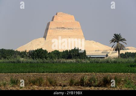 Beni Suef. 16th Oct, 2024. This photo taken on Oct. 16, 2024 shows a view of the Meidum Pyramid in Beni Suef Governorate, Egypt. Meidum Pyramid is thought to be built by Pharaoh Sneferu, the first pharaoh of the Fourth Dynasty of ancient Egypt. The pyramid has a history of around 4,600 years. Credit: Sui Xiankai/Xinhua/Alamy Live News Stock Photo