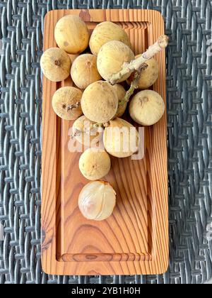 Lanzones fruit (lansium domesticum) commonly known as duku, dokong, longkong, langsat in southeast asia is a sweet translucent flesh fruit Stock Photo