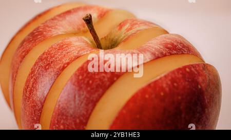 sliced ​​red apple close-up on white background Stock Photo