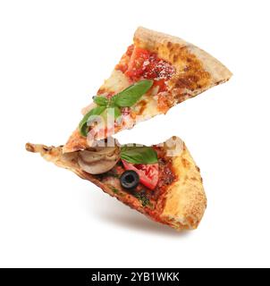 Pizza slices in air on white background Stock Photo