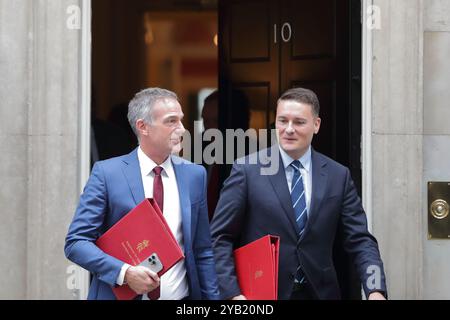 London, United Kingdom,  15 October 2024. Peter Kyle, Secretary of State for Science, Innovation and Technology and Secretary of State for Health, Wes Streeting leave No 10 Downing Street after the  Cabinet Meeting. Stock Photo