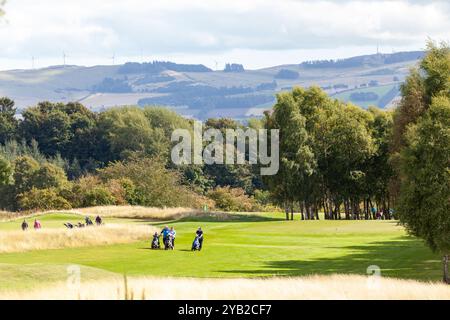 People playing golf on Strathmore Golf Course near  Alyth, Perth and Kinross, Scotland Stock Photo