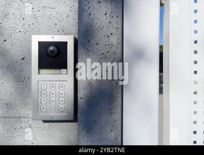 Modern security keypad on outdoor wall Stock Photo