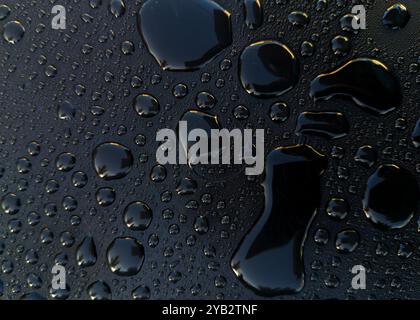 Abstract water droplets on reflective black surface Stock Photo