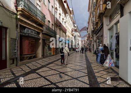 Shopping Street in the Old City of Coimbra, Portugal Stock Photo