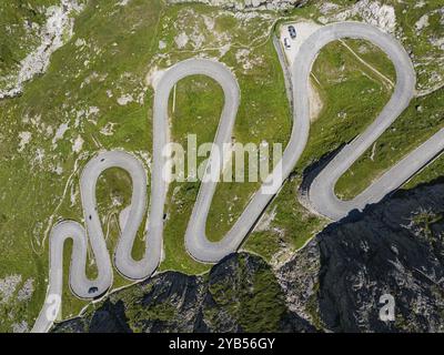 La Tremola, world-famous serpentine road through the Val Tremolo, road construction monument, Alpine pass with 24 hairpin bends. Old Gotthard Pass. Dr Stock Photo