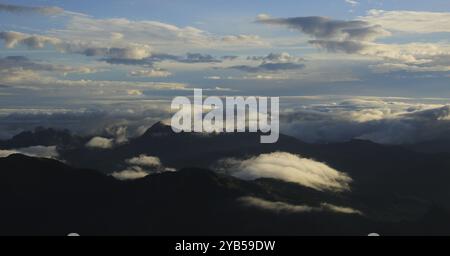 Bright lit clouds over hills in the Entlebuch Region, Switzerland, Europe Stock Photo