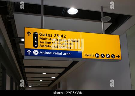 Airport signage for prayer room and animal relief area, Heathrow,London ,England Stock Photo